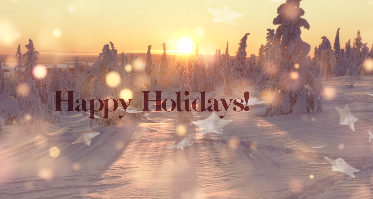 A serene winter landscape at sunrise, featuring snow-covered trees under a golden sky. Light bokeh effects and star shapes overlay the image, with the text 'Happy Holidays!' prominently displayed in elegant dark red font.